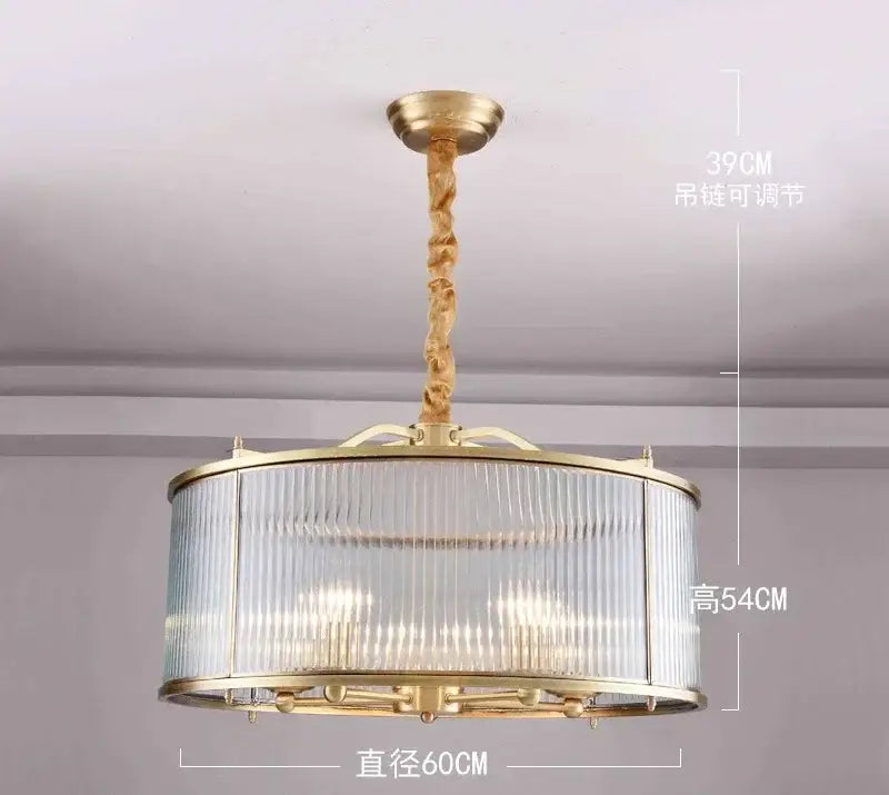 Gold-toned decorbites glass chandelier with ribbed cylindrical glass shade and adjustable twisted chain for living room pendant light