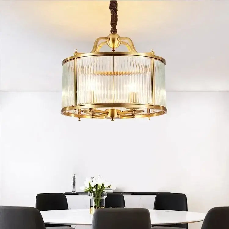 Brass-framed ribbed decorbites glass chandelier with vertical panels and twisted bronze chain for living room lighting