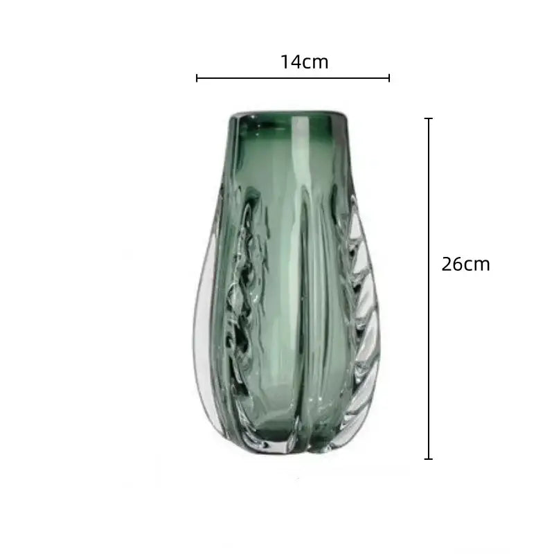 A sleek 26cm translucent green decorbites crystal vase with fluted teardrop shape and vertical ridges for living room decor