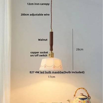 Off-white ribbed glass and walnut decorbites ceramic led pendant lamp with hand-painted floral pattern and warm light