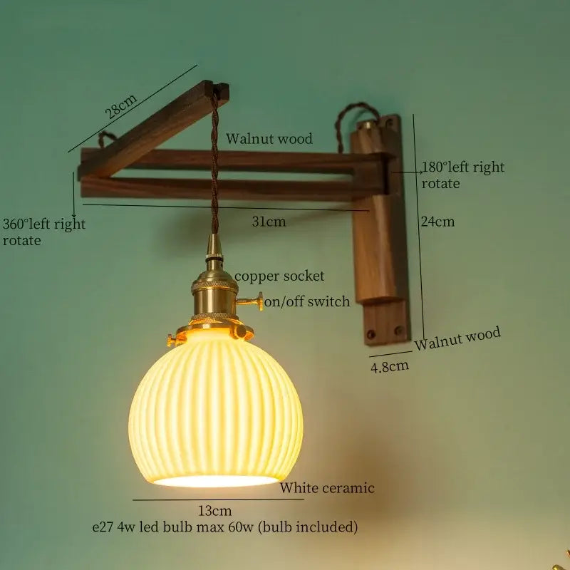 A warm glowing white ceramic led wall sconce with vertical ridges on walnut wood bracket by decorbites ceramic led