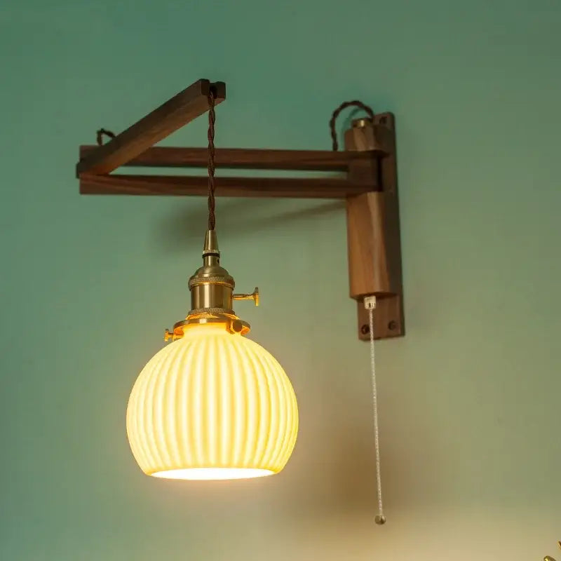 Warm yellow ribbed glass wall sconce with brass hardware and wooden arm for bedroom decorbites ceramic led light