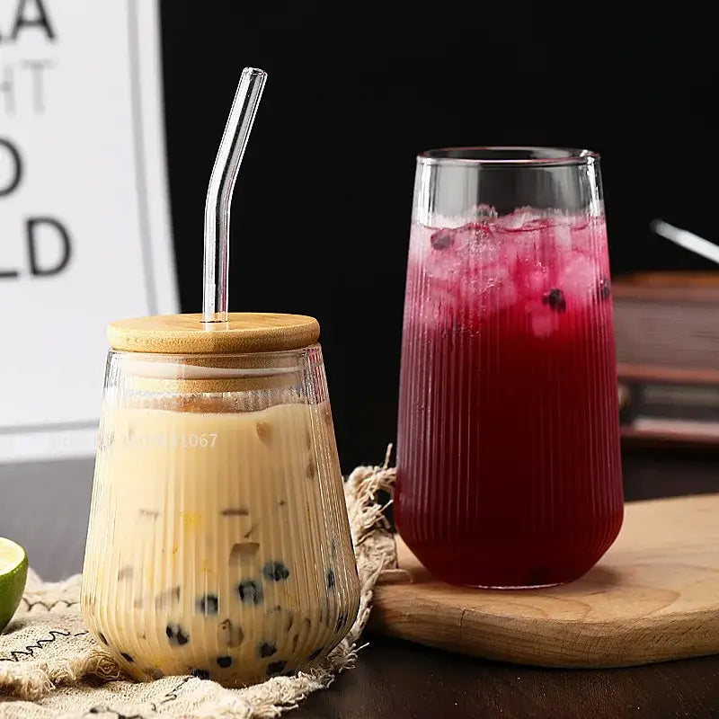 Clear ribbed glass cup set with bamboo lid and stainless steel straw for kitchen dining use