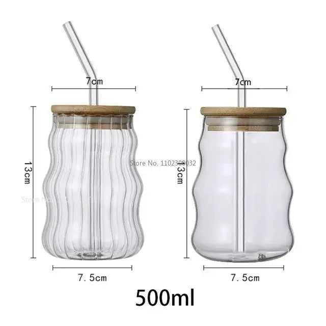 Ribbed clear glass cup with bamboo lid and lip straw featuring vertical ridges on the left side for decorbites glass cup