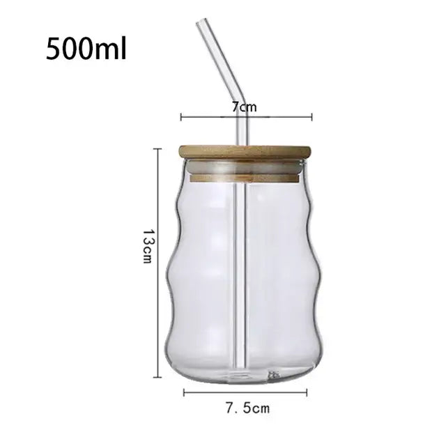 Clear ribbed glass cup with bamboo lid and transparent lip straw featuring a wavy design for decorbites glass cup