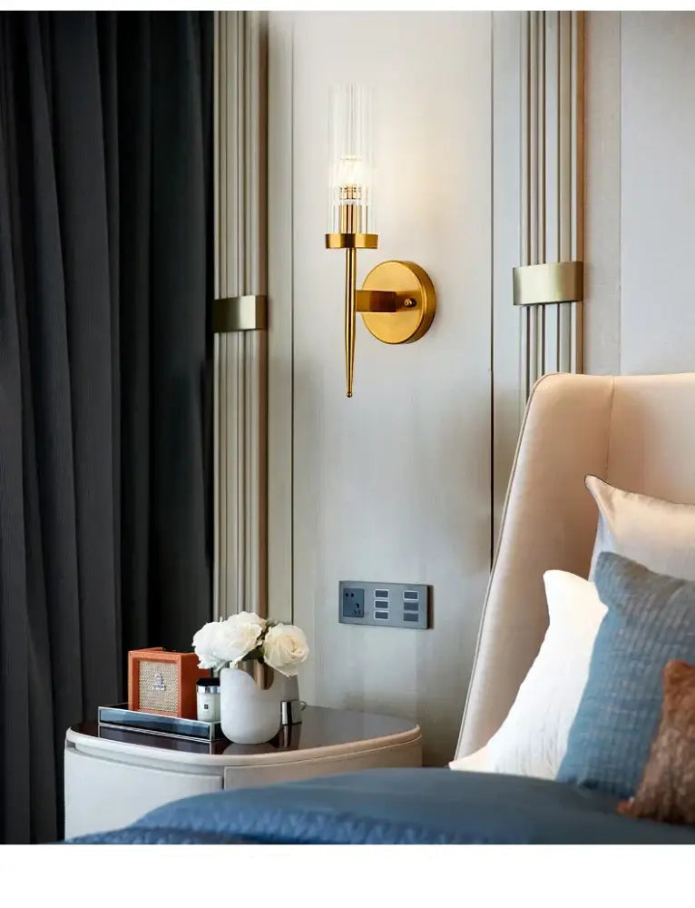 Gold led wall ribbed glass wall lights with slender vertical stem and clear glass shade for bedroom decorbites gold led