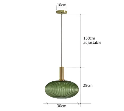 Green ribbed glass pendant light with brass hardware ideal for amber green and grey dining room glass pendant light decor