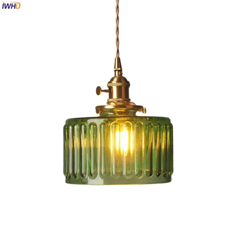 Ribbed green glass pendant light with brass hardware for bedroom featuring elegant glass pendant light design