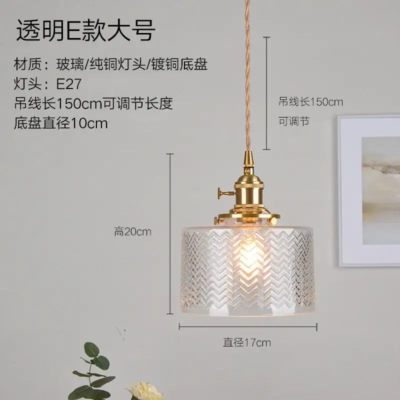 Green glass pendant light with ribbed chevron pattern, brass hardware, and adjustable 150cm cord for bedroom use