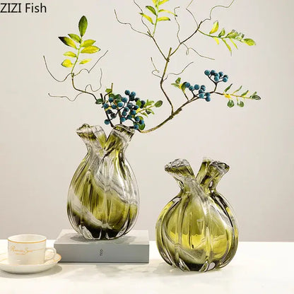Two translucent olive green glass vases with ribbed surfaces and dual necks for vase hydroponics plant use