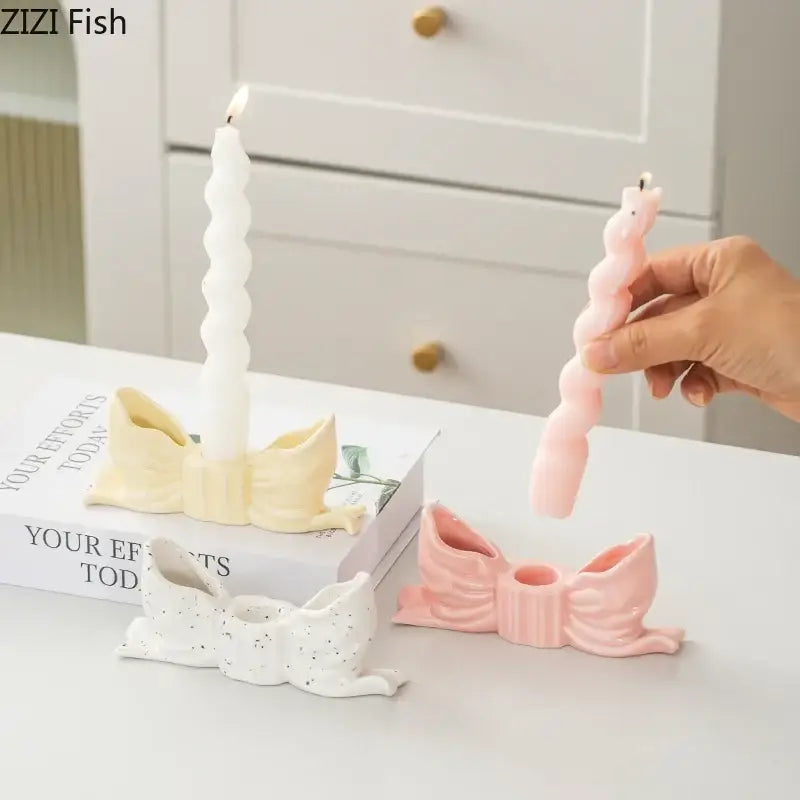 Delicate ribbed pink ceramic bowknot candle holder with central hole for candles ideal for bedroom decorbites decor