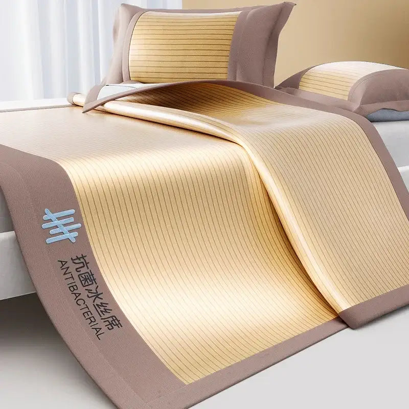 Beige and brown bamboo cooling bed mat set with soft striped texture and ribbed pink pleated design for bedroom use