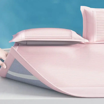 Pink ribbed soft bed mat set with breathable mesh backing and matching pillowcases for comfortable bedroom use