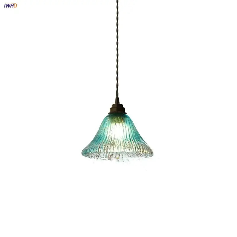 Teal blue glass led pendant light with ribbed texture and twisted metal chain for dining room decorbites blue glass design
