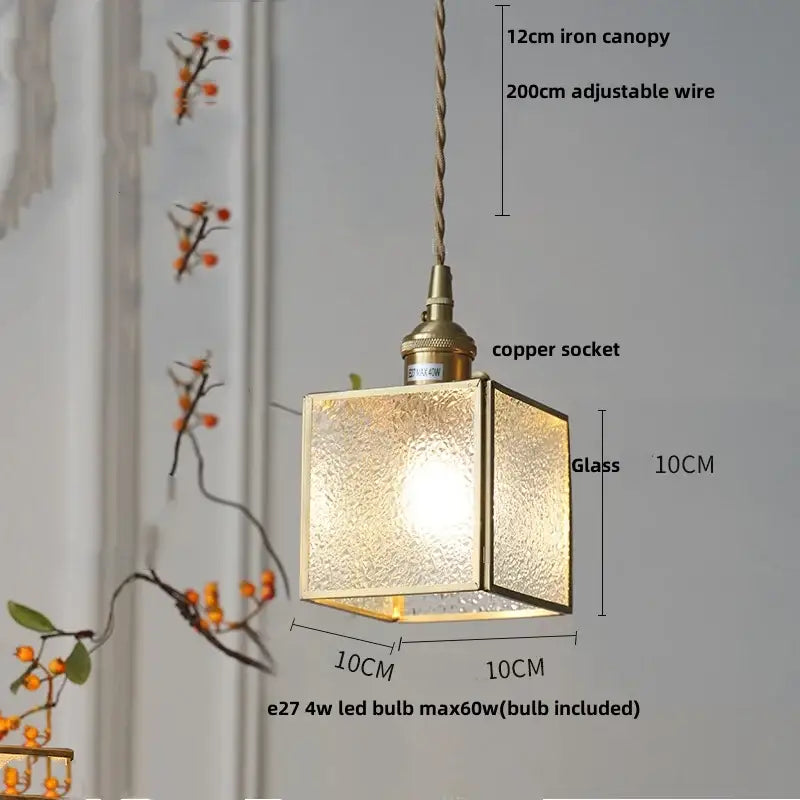 Square glass pendant light with brass frame and frosted panels for dining room featuring decorbites blue glass led