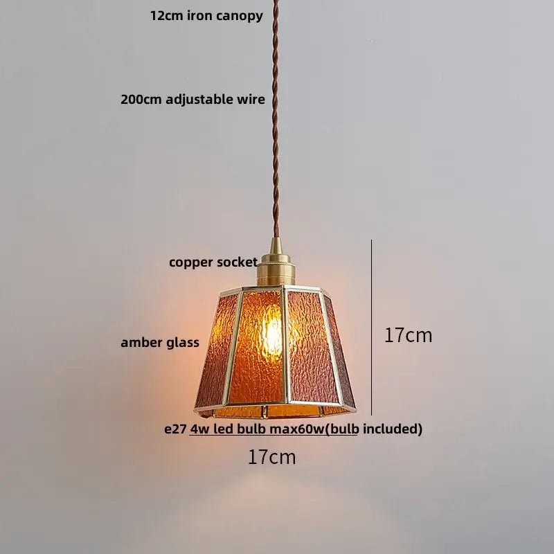 A warm amber glass pendant light with brass copper socket and twisted iron canopy for decorbites blue glass led decor