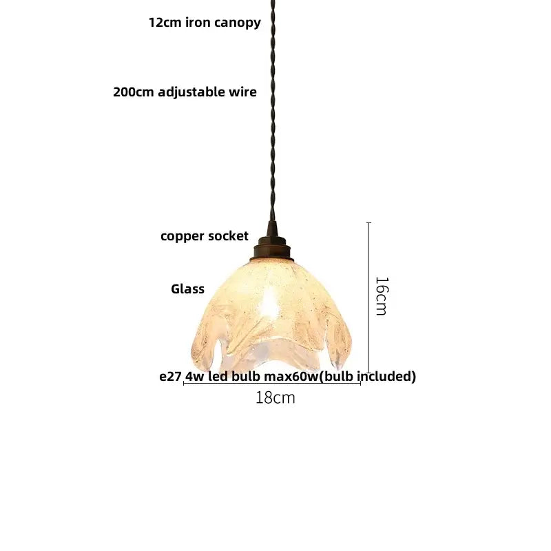 A warm-toned ribbed teal blue glass led pendant light with textured leaf design for dining room decorbites blue glass