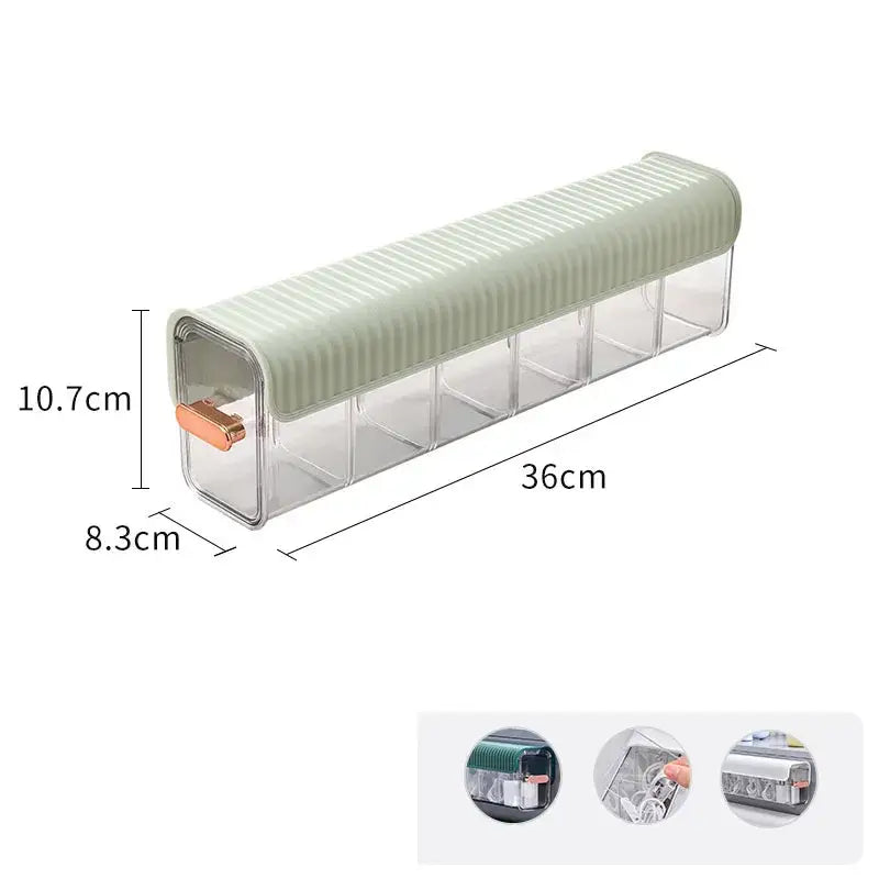 A sleek translucent plastic data cable organizer box with a sage green ribbed lid and rose gold pull-tab for decorbites