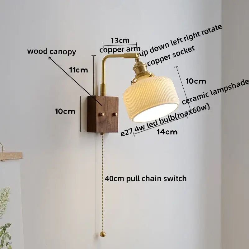 A warm brass-finished copper led wall lamp with a ribbed white ceramic shade and wooden canopy for bedroom mirror light