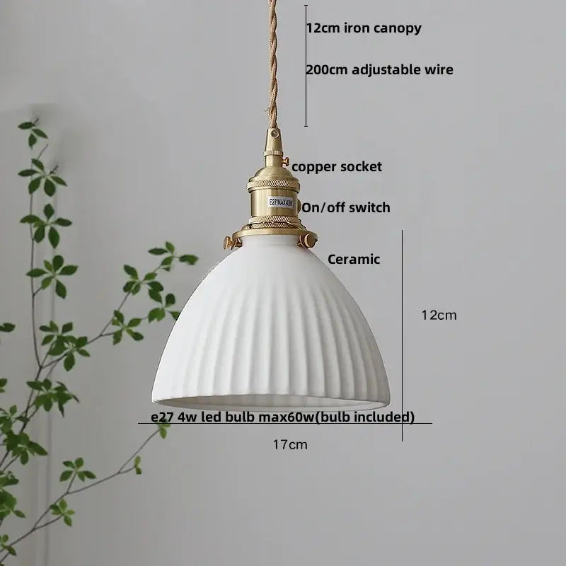Ribbed white ceramic pendant light fixture with fluted dome shade and brass knob switch ideal for kitchen lighting