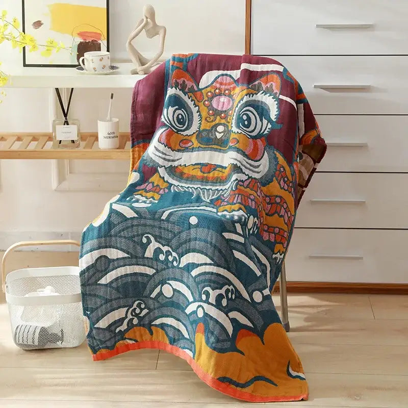 Vibrant cotton bath towel featuring a colorful cartoon lion and stylized ocean waves in beige black floral design