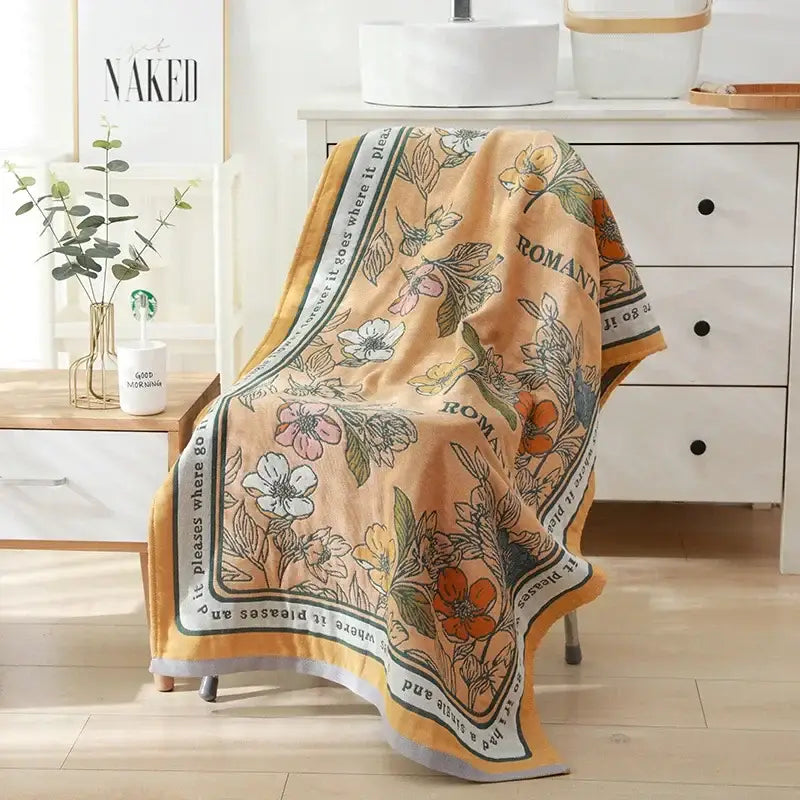 Romantic beige and black floral cotton bath towel with peach-colored embroidered cotton bath design for bathroom decor