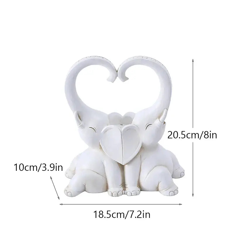 White resin decorbites elephant couple figurine with heart-shaped trunks and central heart motif for living room decor
