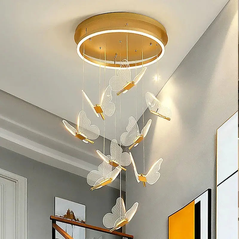 Romantic gold butterfly led chandelier featuring gold-toned circular ceiling light with translucent butterfly pendants decorbites butterfly led