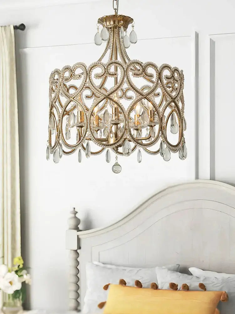 Romantic gold crystal heart ceiling light chandelier with intricate scrollwork and dangling crystal teardrops decorbites crystal heart