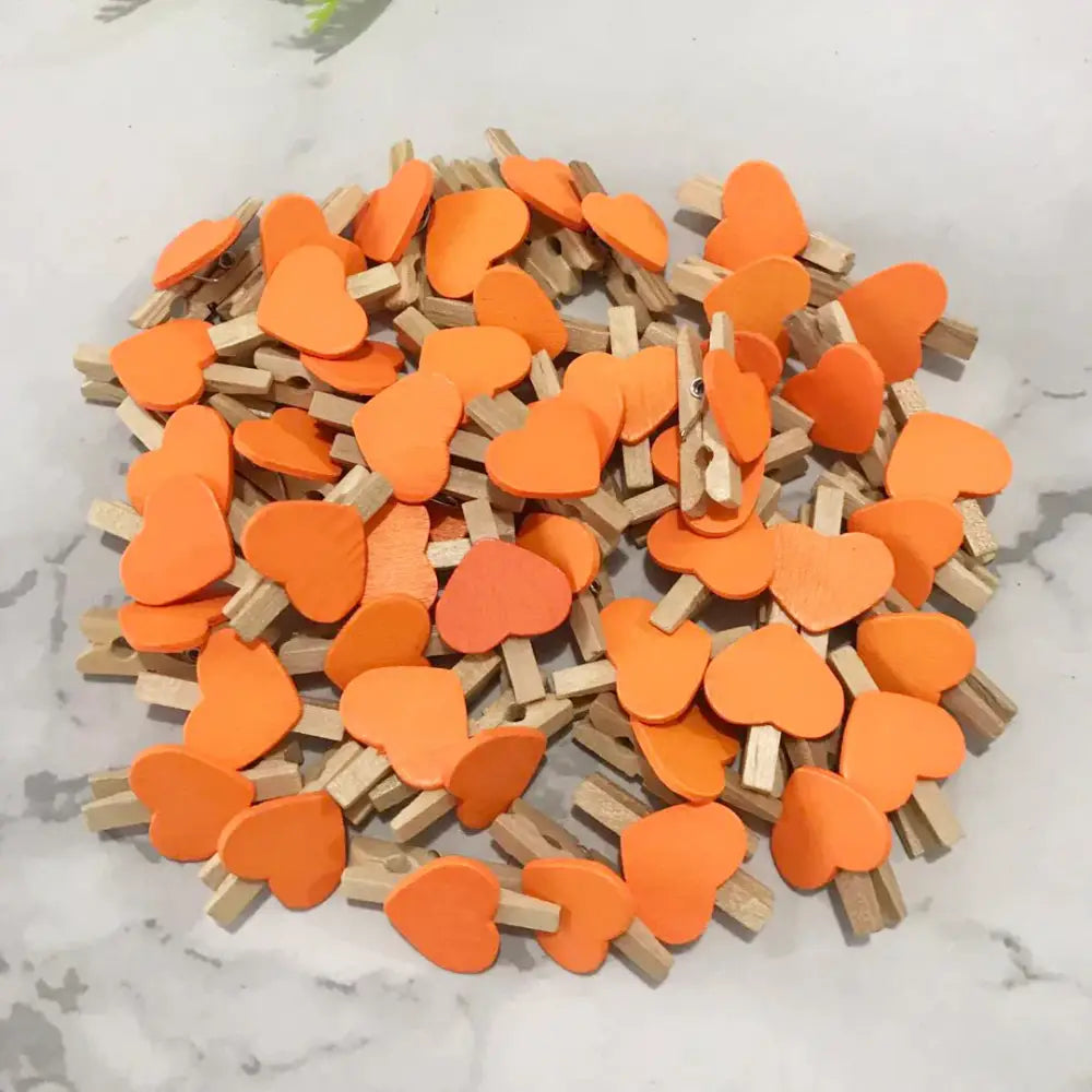 Orange heart shape wood clips made of wood for romantic bedroom decor multi color wooden clothespins
