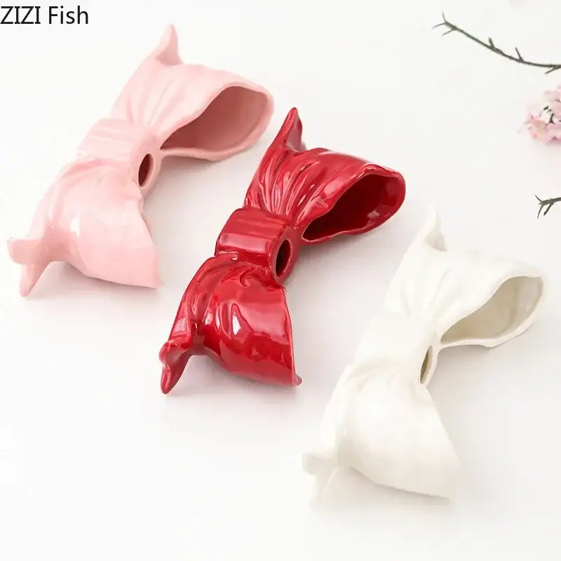 Romantic pink red and white bowknot ceramic candle holder with glossy finish for dining room decor by decorbites bowknot ceramic