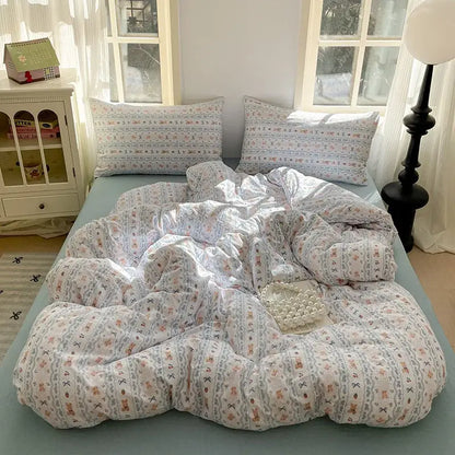 Romantic pink cotton flower print bedding set featuring a cozy light blue and white floral decorbites cotton flower duvet