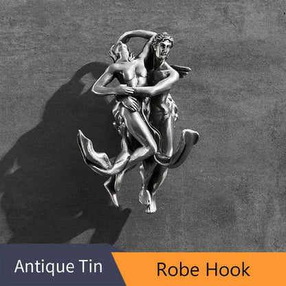 Antique tin robe hook with silver toned sculpture of two embracing figures in romantic silver angel bathroom hardware set