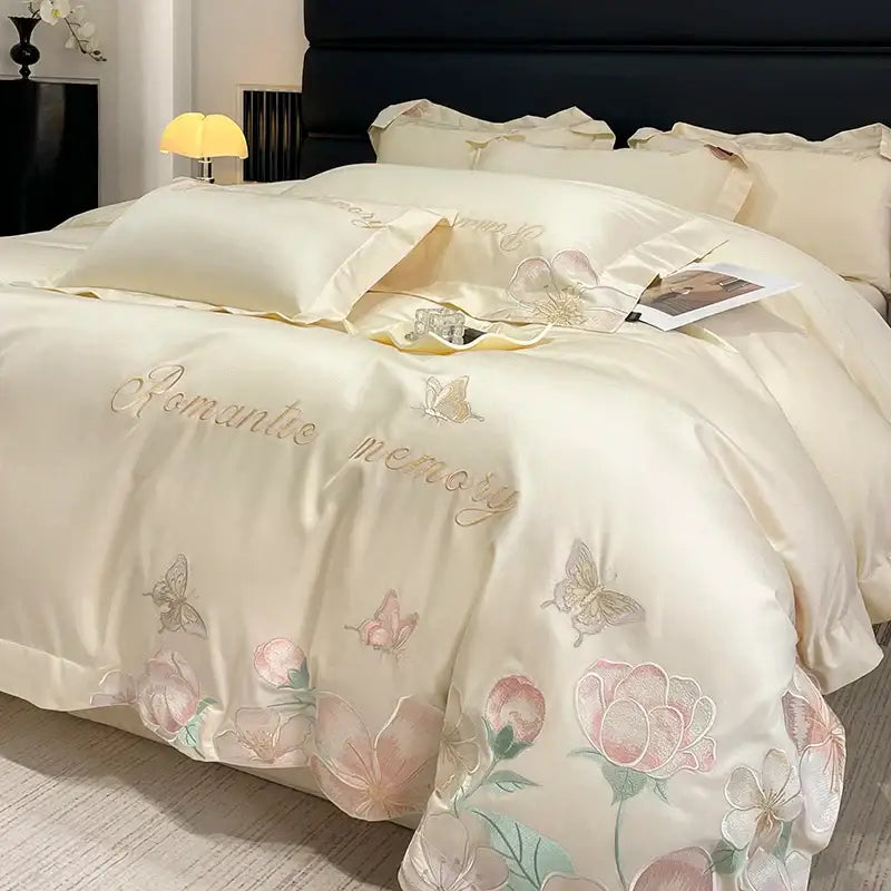 Cream-colored satin bedding set with delicate pink and gold embroidered flowers butterfly motifs for romantic bedrooms