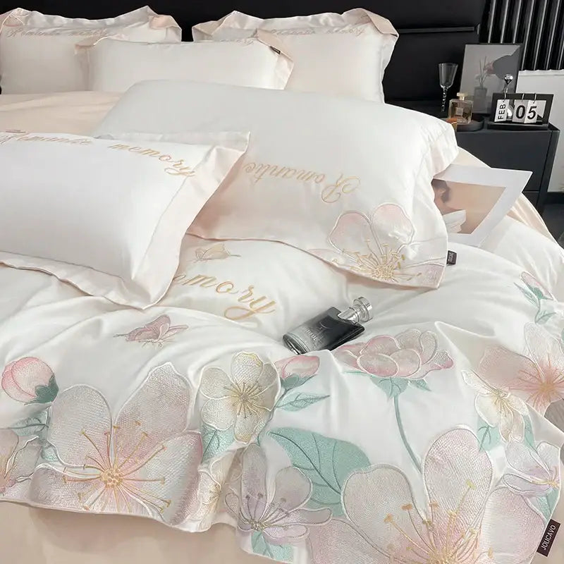 White satin bedding set with delicate pink and gold embroidered flowers butterfly and soft pastel accents