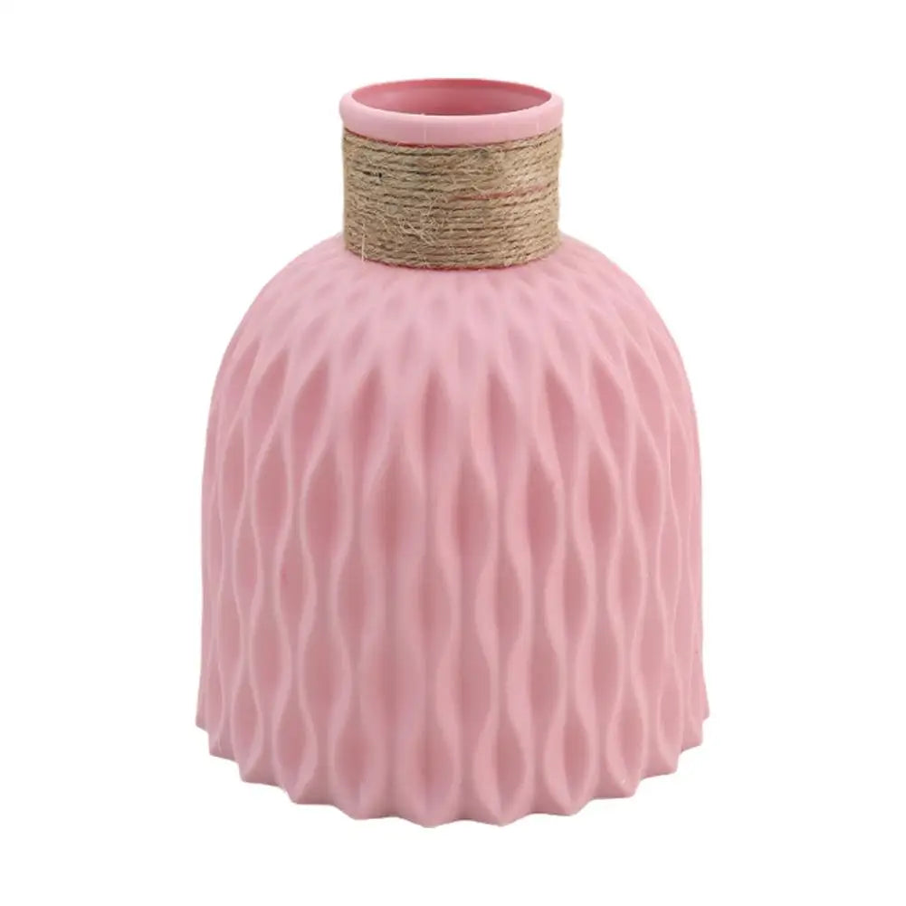 Pink ceramic rope plastic vase with textured wavy pattern and twine wrap for living room flower arrangement decor