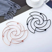 Rose flower iron pan pot mat available in black and rose gold colors for decorbites iron pan kitchen use