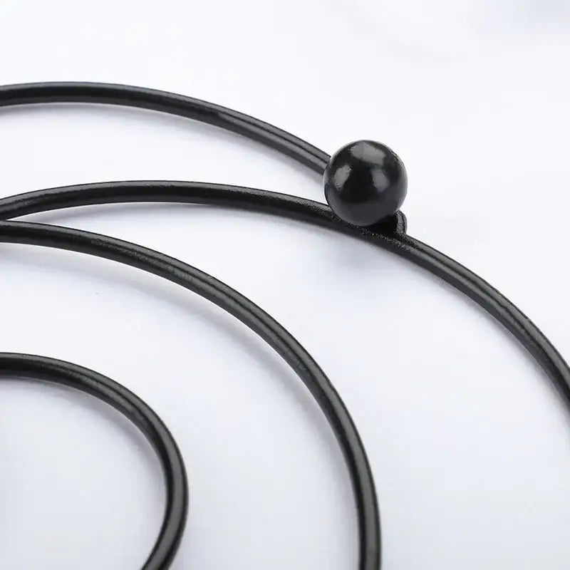 Black leather cord with a glossy black bead for decorbites iron pan pot mat in black and rose gold kitchen coasters
