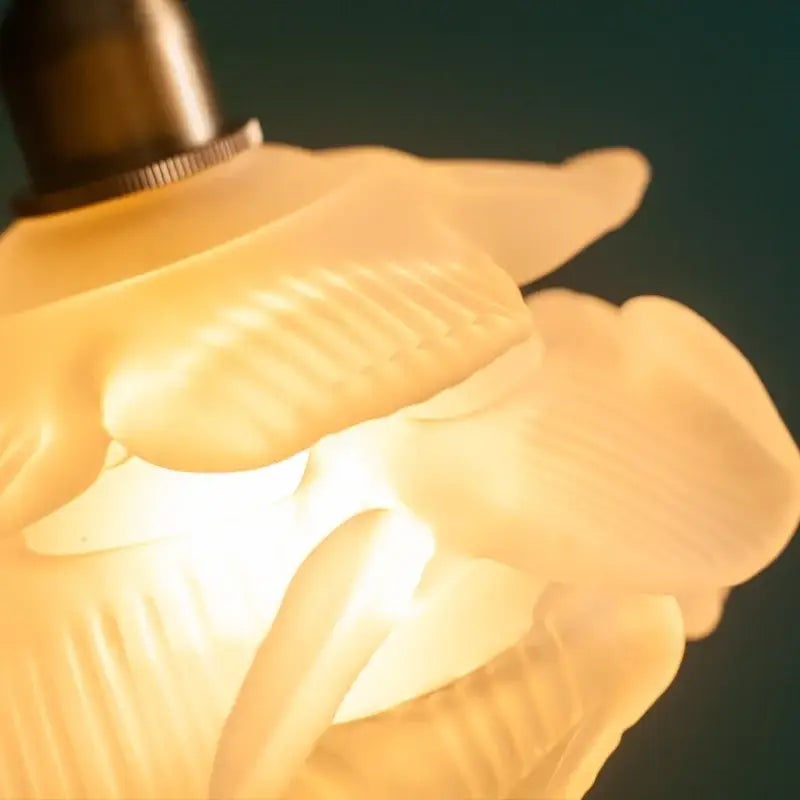 Rose frosted white glass pendant lamp with warm-toned frosted white glass and brass-finished top for living room light