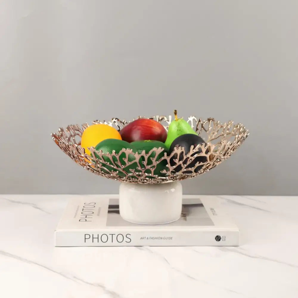 Rose gold coral disc pedestal marble fruit bowl with intricate leaf lace pattern and white ceramic base decorbites coral disc