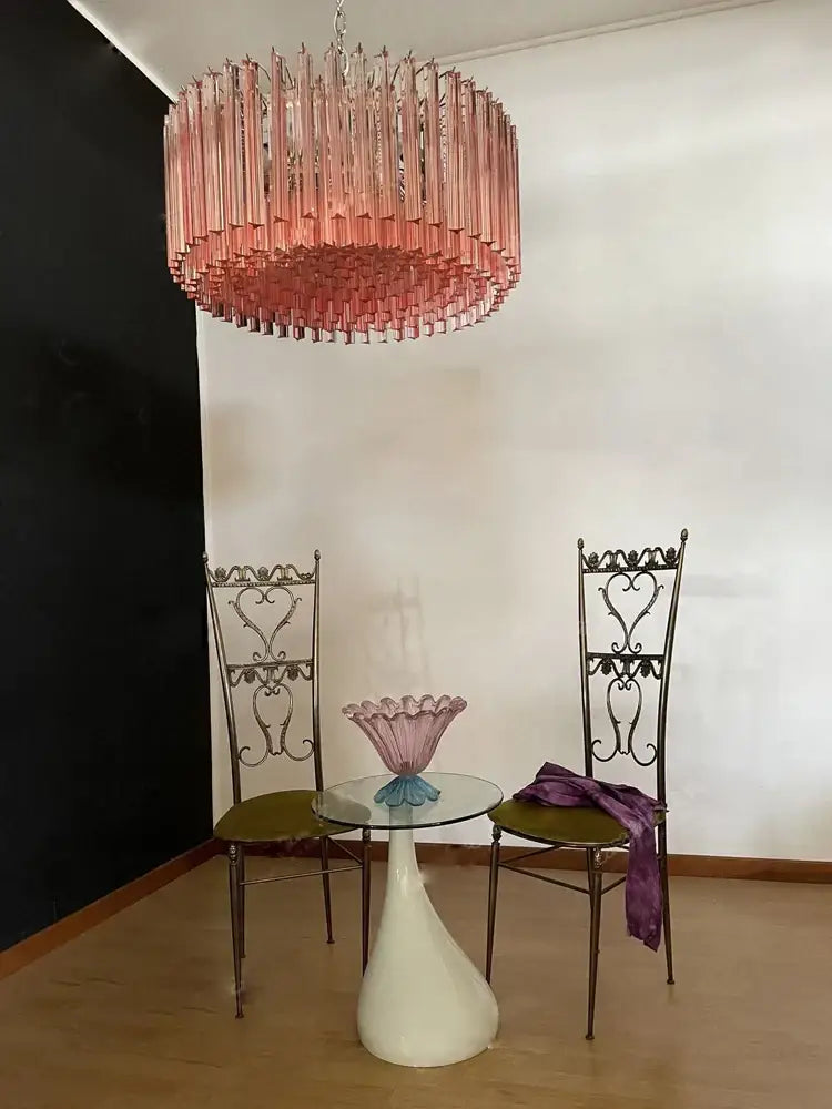 Rose gold pink glass chandelier with cascading translucent glass tubes ideal for kitchen or living room lighting