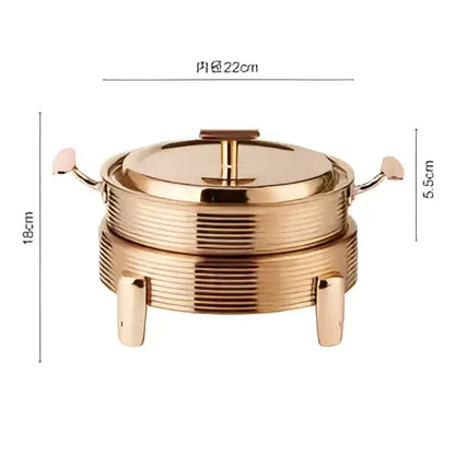Rose gold plated hot pot alcohol chafing dish with ribbed exterior and four sturdy feet for dining room use