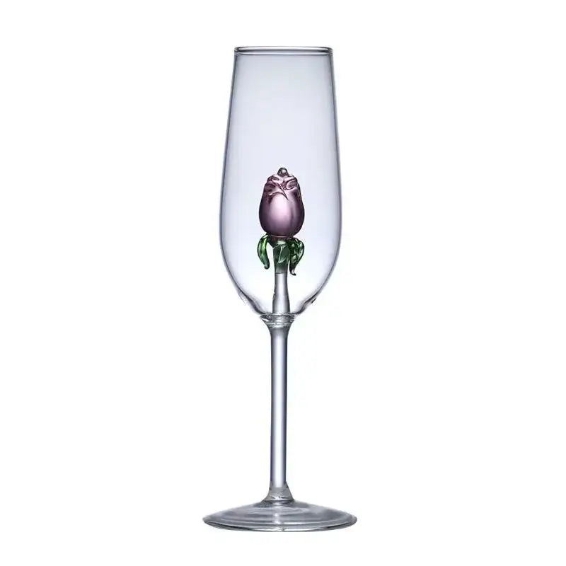 A clear glass rose stemware wine glass features a hand-blown purple decorbites 3d rose with green leaves in the stem