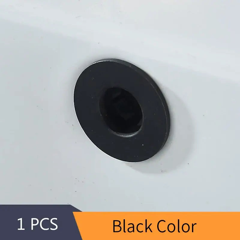Black circular plastic overflow cover with central hole for decorbites brass sink overflow kitchen and bathroom inserts