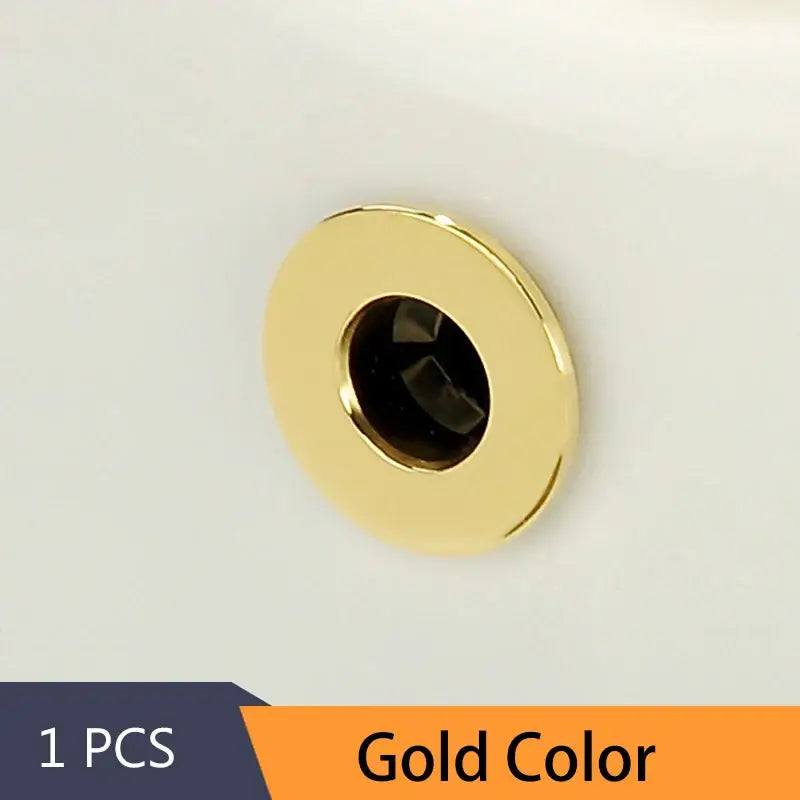 Gold-colored round brass sink overflow cover with polished metallic finish for kitchen and bathroom decorbites brass sink inserts