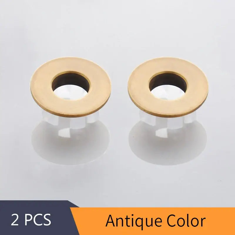 Two antique brass-colored metal grommets round brass sink overflow cover set decorbites brass sink inserts