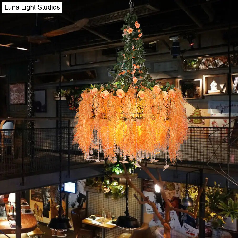 Round Cage Chandelier Light in Orange Metal with Plant Decor - 4-Bulb Pendant Lamp for Warehouse Ceilings