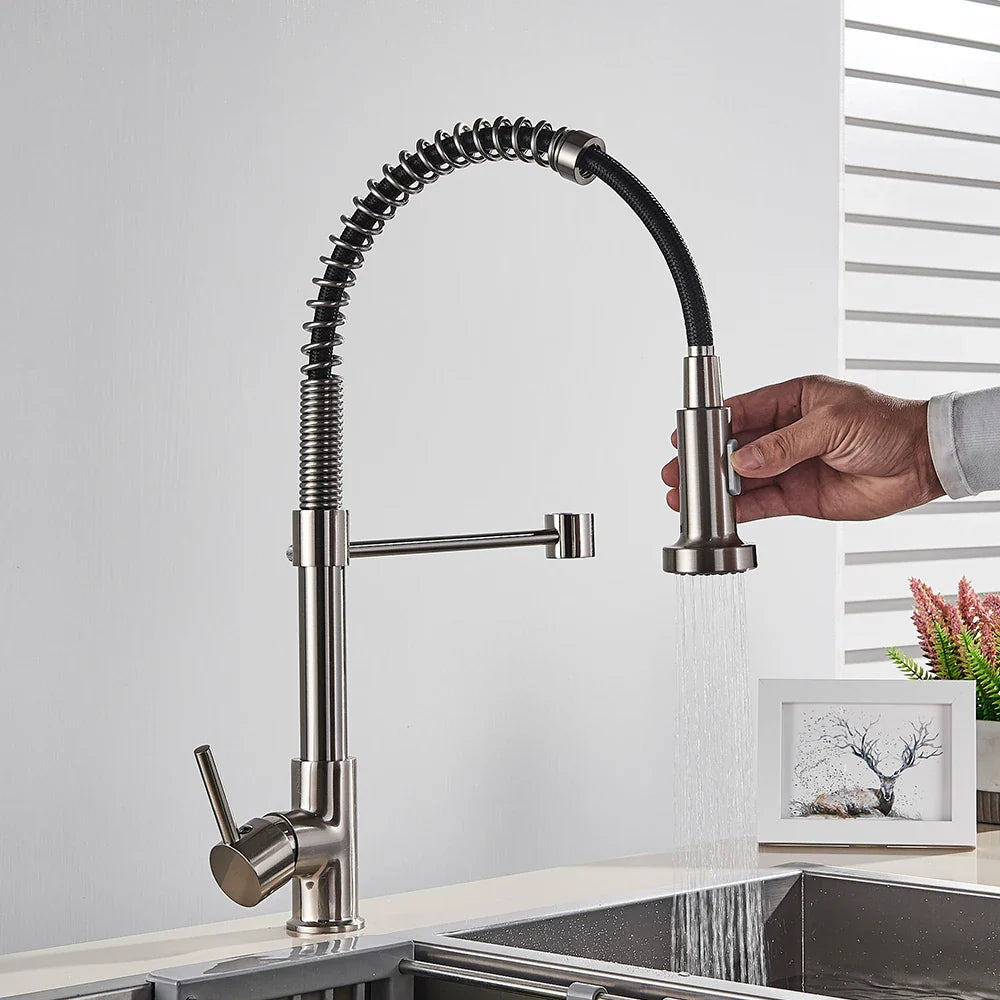 Modern Rozin brushed nickel deck mounted kitchen faucet with single hole flexible coiled hose and pull-out spray head
