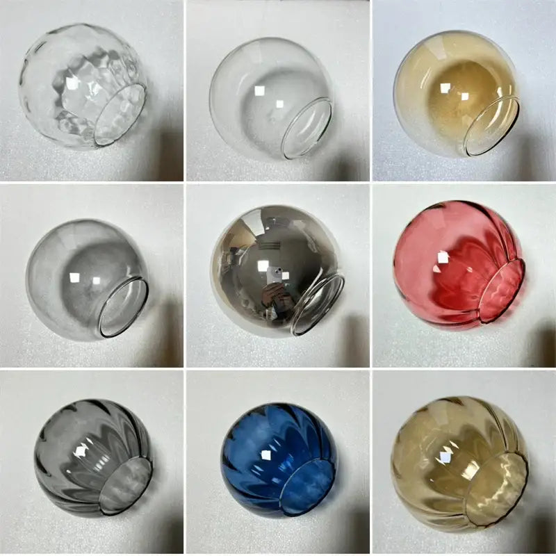 Clear, amber, red, gray, blue, and brown decorbites glass ball pendant lamp shades with smooth rounded design for living room decor