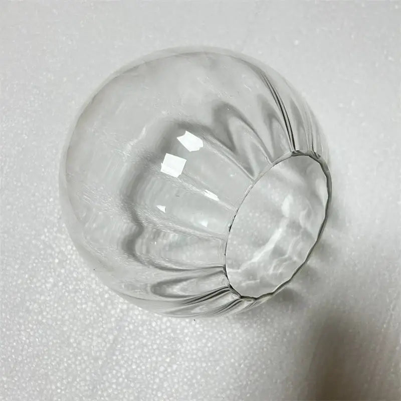 Clear glass ball pendant with fluted scalloped design and smooth base for decorbites glass ball pendant lamp living room decor